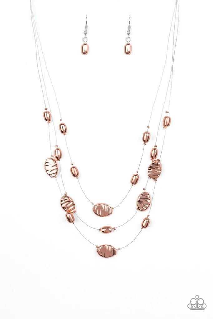 Paparazzi Accessories Top Zen - Copper Featuring smooth and delicately hammered finishes, mismatched shiny copper beads are threaded along dainty silver wire, creating floating layers below the collar. Features an adjustable clasp closure. Sold as one ind