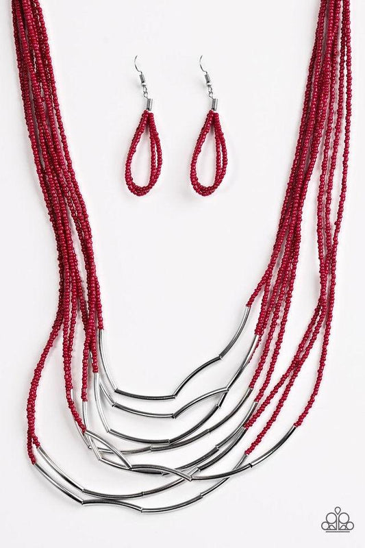 Paparazzi Accessories Living the GLEAM - Red Infused with two large silver fittings, shiny red seed beads are threaded along countless strands, creating dramatic layers below the collar. Shimmery silver accents slide along the centers of the strands, addi