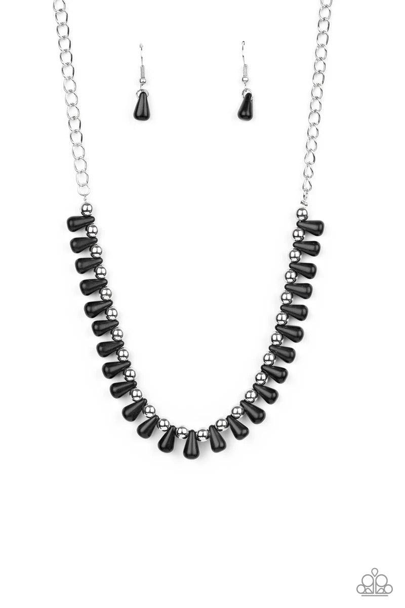 Paparazzi Accessories Extinct Species - Black Black teardrop stones and classic silver beads are threaded along an invisible wire. The earthy beads alternate below the collar, creating a wild fringe. Features an adjustable clasp closure. Sold as one indiv
