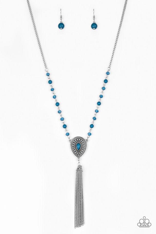 Paparazzi Accessories Soul Quest - Blue Polished and crystal-like blue beads trickle along a shimmery silver chain, giving way to a glistening teardrop pendant. Infused with studded detail and a matching blue beaded center, the ornate pendant gives way to