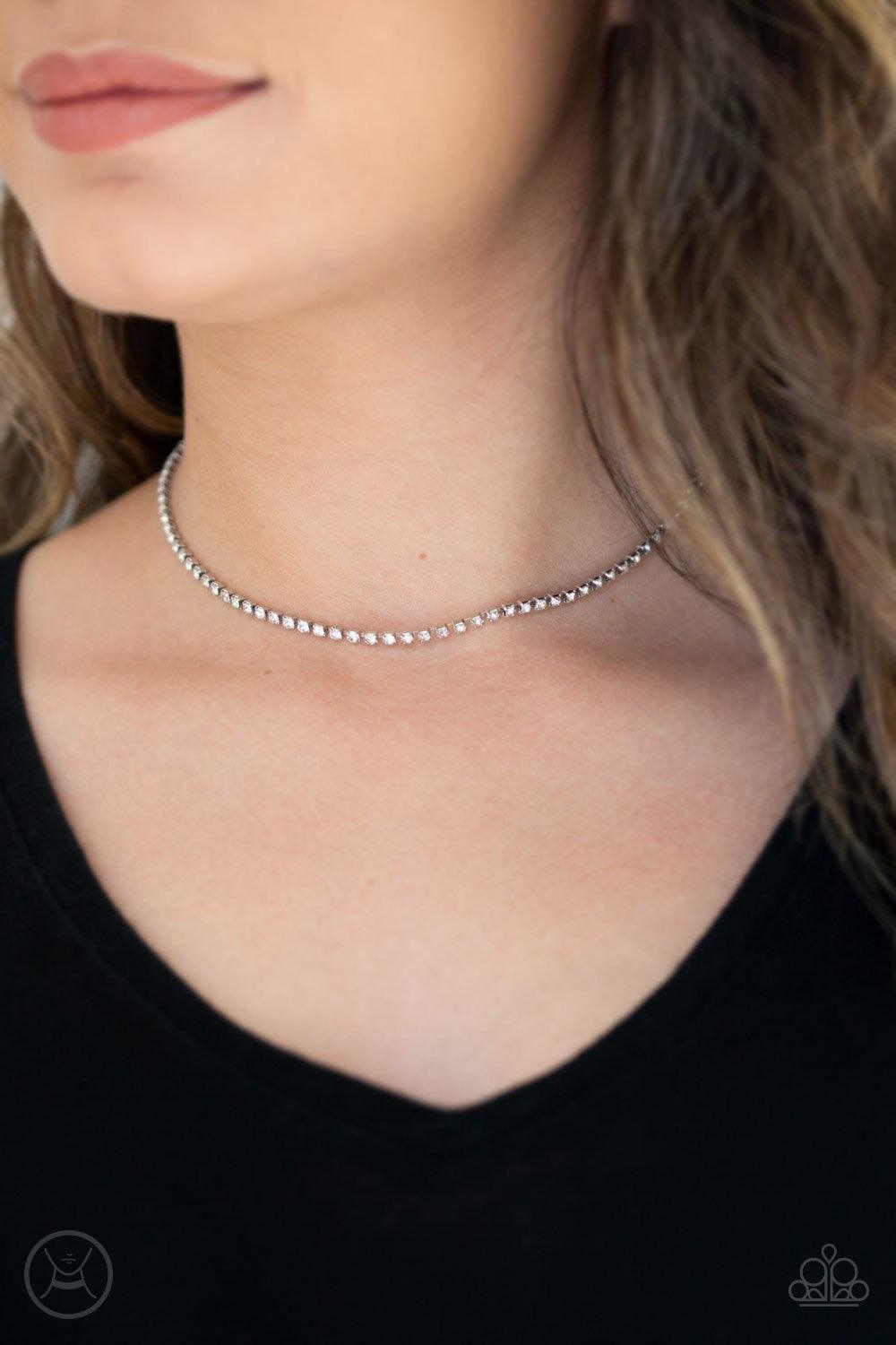 Paparazzi Accessories Pitch PURR-fect - White Pressed into sleek silver square frames, a strand of glittery white rhinestones wraps around the neck for an edgy look Features an adjustable clasp closure. Jewelry