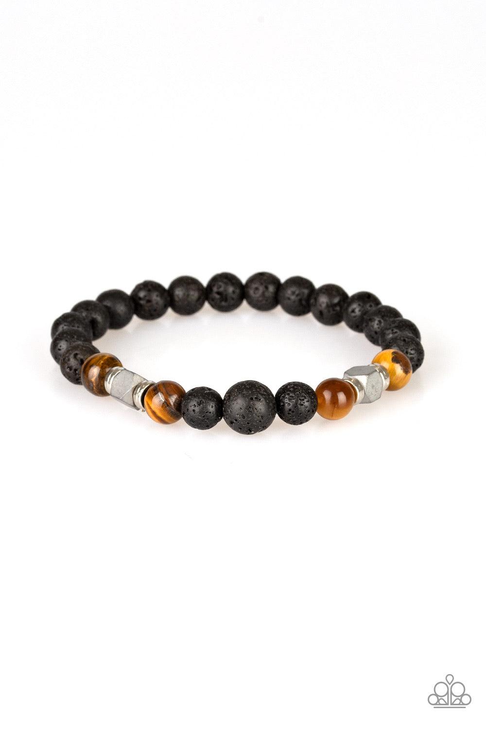 Paparazzi Accessories Strength - Brown Earthy black lava rocks, shiny tiger's eye stones, and flashy metallic accents are threaded along a stretchy band around the wrist for a seasonal flair. Jewelry