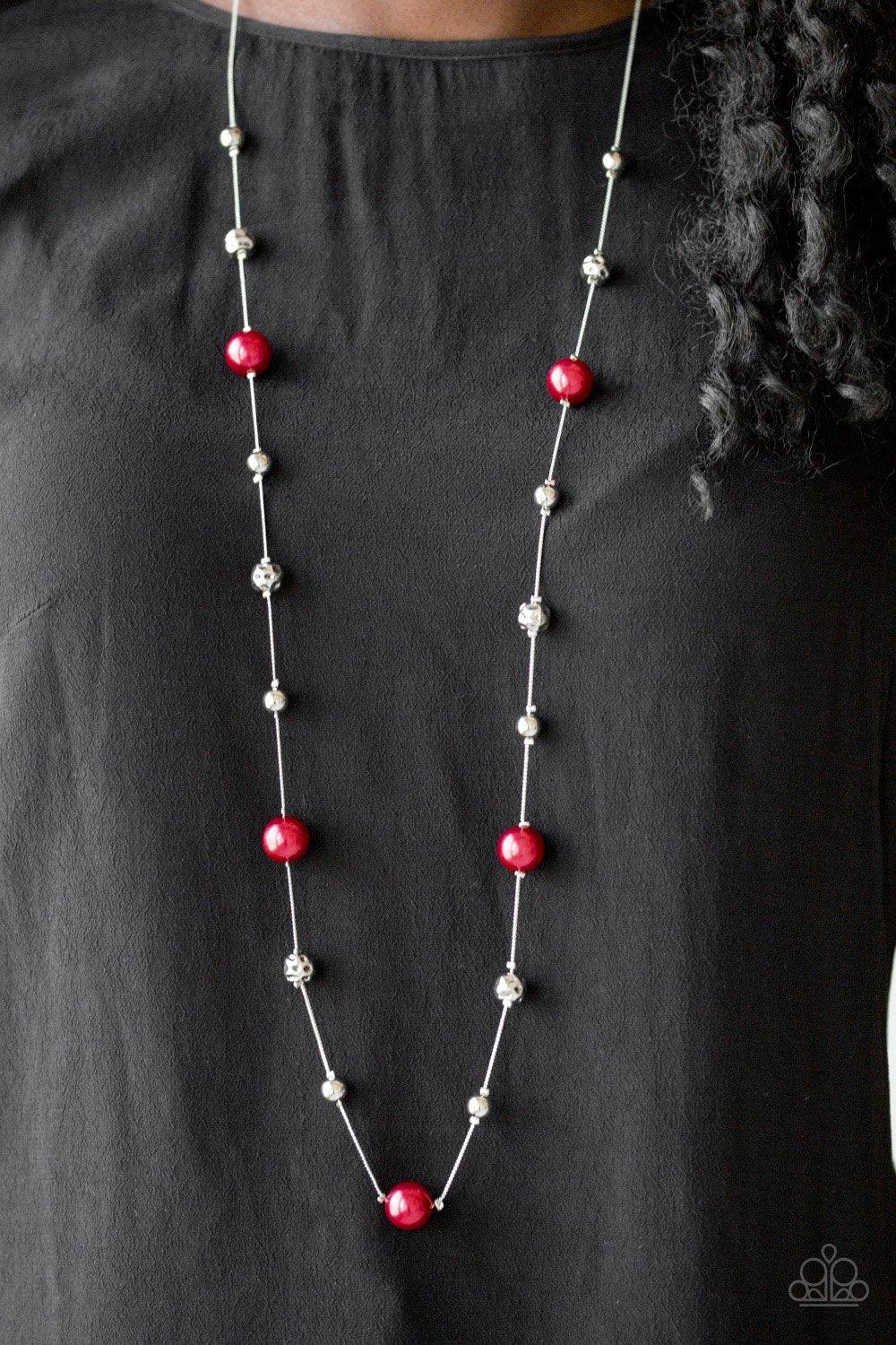 Paparazzi Accessories Eloquently Eloquent - Red Infused with pearly red accents, classic silver and delicately hammered silver beads trickle along an elegantly elongated silver chain for a refined look. Features an adjustable clasp closure. Sold as one in
