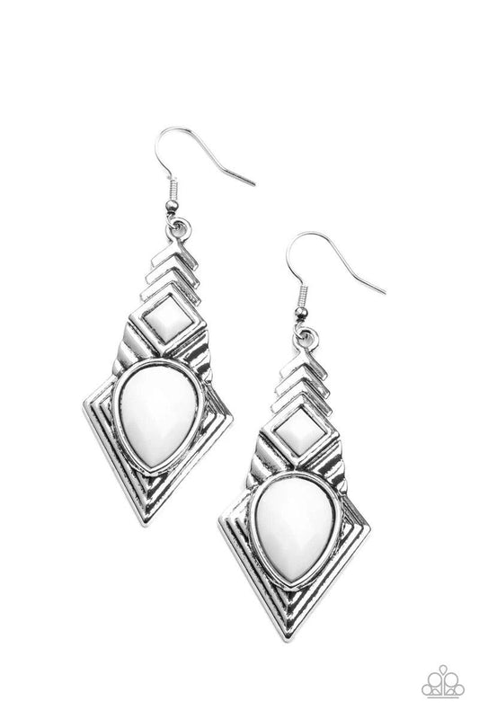 Paparazzi Accessories Stylishly Sonoran - White Faceted white square and teardrop beads are pressed into a silver geometric frame rippling with stacked linear patterns. Earring attaches to a standard fishhook fitting. Sold as one pair of earrings. Jewelry
