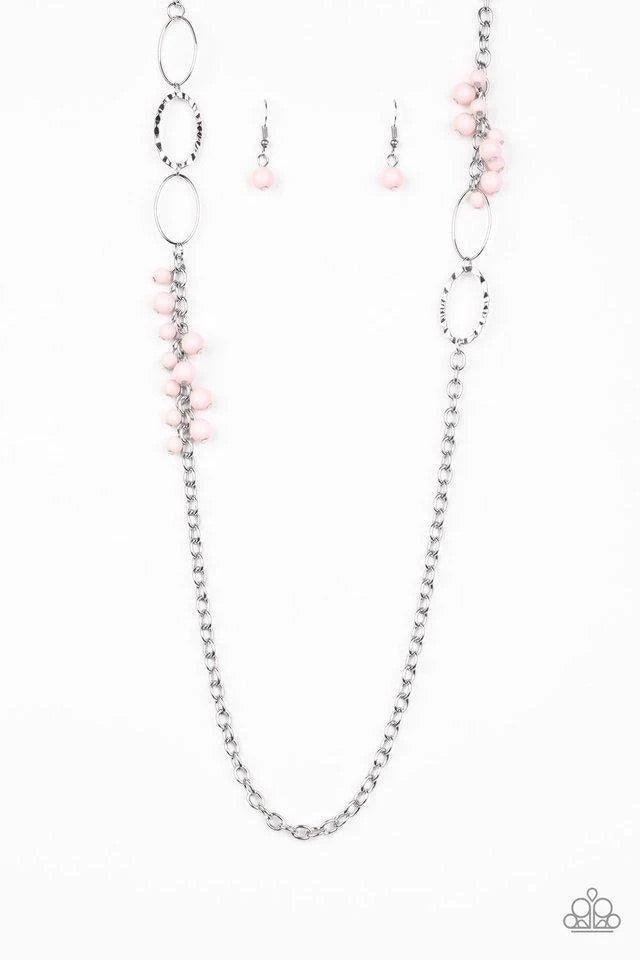 Paparazzi Accessories Flirty Foxtrot - Pink Smooth and hammered silver rings join clusters of shiny pink beads along a shimmery silver chain for a colorful look. Features an adjustable clasp closure. Sold as one individual necklace. Includes one pair of m
