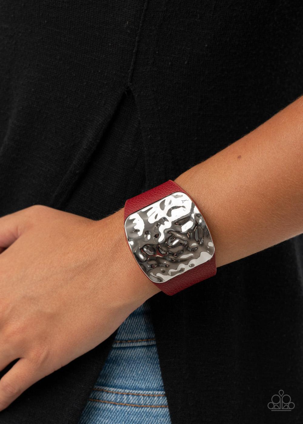 Paparazzi Accessories Brighten Up - Red A hammered silver square-like frame gently curves with a thick red leather band, creating a colorfully rustic centerpiece atop the wrist. Features an adjustable snap closure. Sold as one individual bracelet. Jewelry