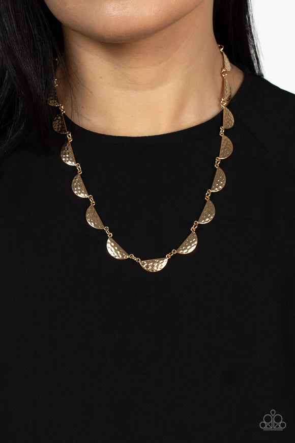 Paparazzi Accessories Lunar Jungle - Gold A celestial display of hammered half-moon gold discs link together for a cosmic charm below the collar. Features an adjustable clasp closure. Sold as one individual necklace. Includes one pair of matching earrings