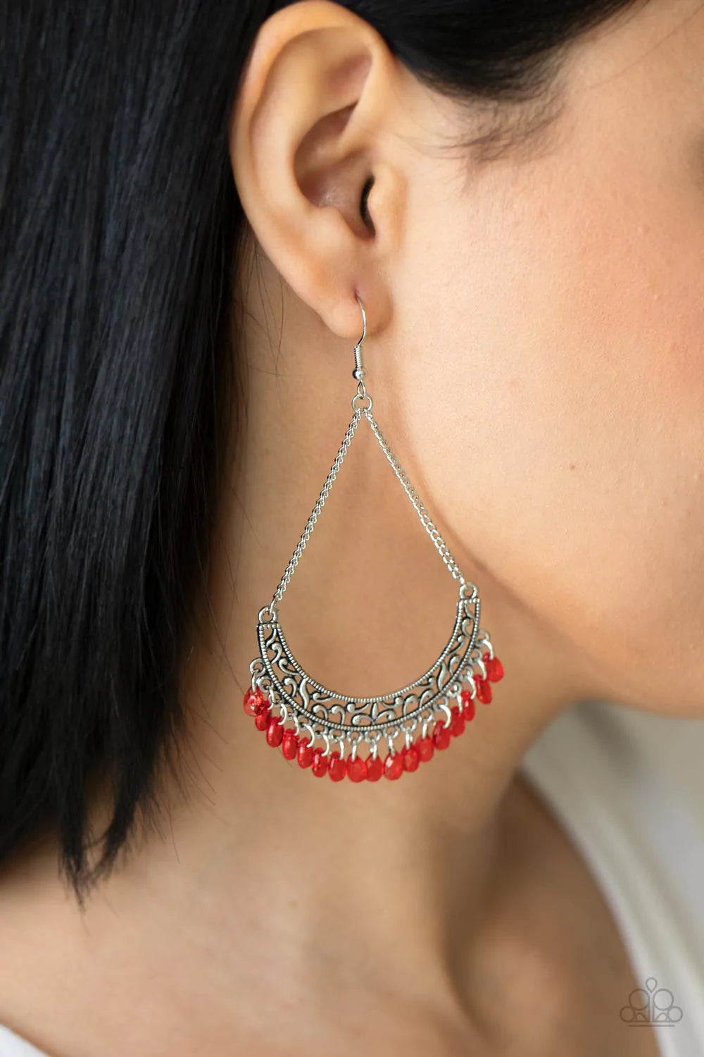 Paparazzi Accessories Orchard Odyssey - Red Suspended by two silver chains, a half moon silver frame filled with vine-like filigree gives way to a dainty fringe of glassy red teardrop beads for an enchanting fashion. Earring attaches to a standard fishhoo