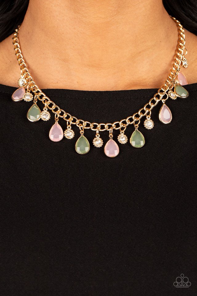 Paparazzi Accessories Frosted and Framed - Multi A thick gold chain is decorated in faceted Loden Frost and baby pink teardrops wrapped in gold frames. The opacity of the beads adds a dreamy feel to the design, while tiny gold accents dotted with white rh