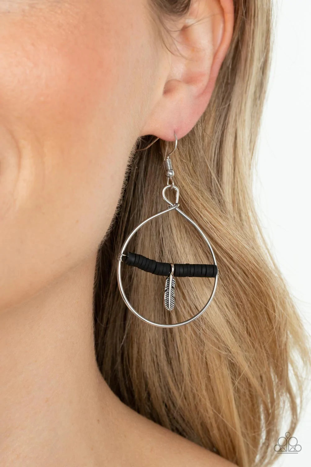 Paparazzi Accessories Free Bird Freedom White: Infused with a dainty silver feather charm, a dainty row of rubbery white discs are threaded along a metallic rod inside an airy silver hoop for a free-spirited fashion. Earring attaches to a standard fishhoo