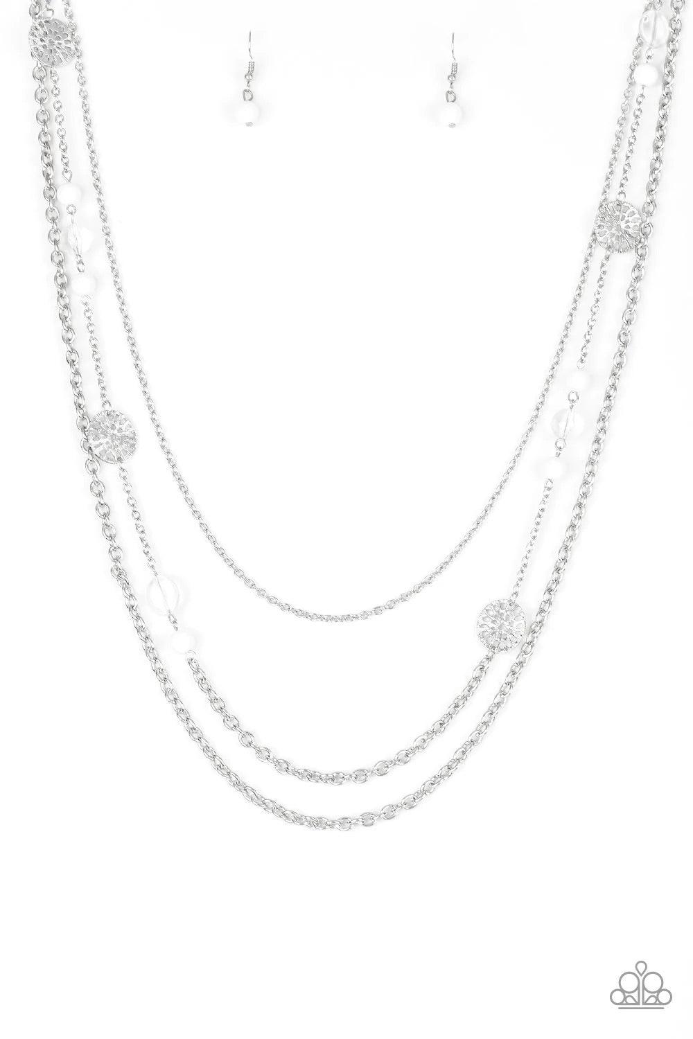 Paparazzi Accessories Pretty Pop-tastic! - White Ornate silver accents, glassy beads, and polished white beads trickle along strands of shimmery silver chains for a whimsical look. Features an adjustable clasp closure. Sold as one individual necklace. Inc