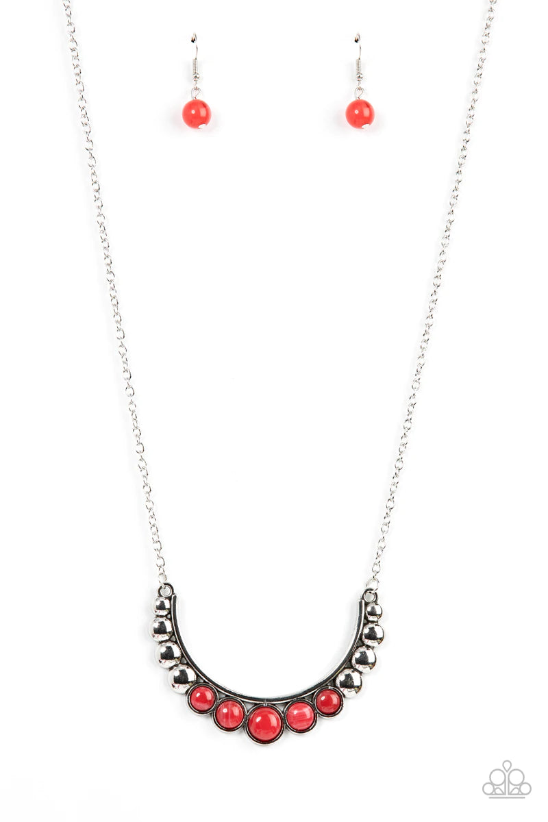 Paparazzi Accessories Horseshoe Bend - Red Flat silver beads fade into cloudy red stone beads as they bow into a half moon at the bottom of a curved silver bar, creating an ethereal pop of color at the bottom of an extended silver chain. Features an adjus