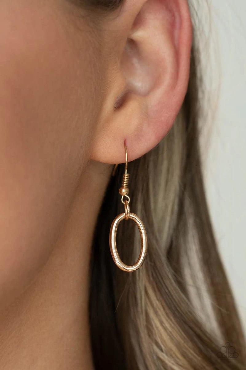 Paparazzi Accessories Defined Drama - Gold Pairs of joined gold links connect a collection of gold oval frames below the collar, creating an edgy chain. Features an adjustable clasp closure. Sold as one individual necklace. Includes one pair of matching e