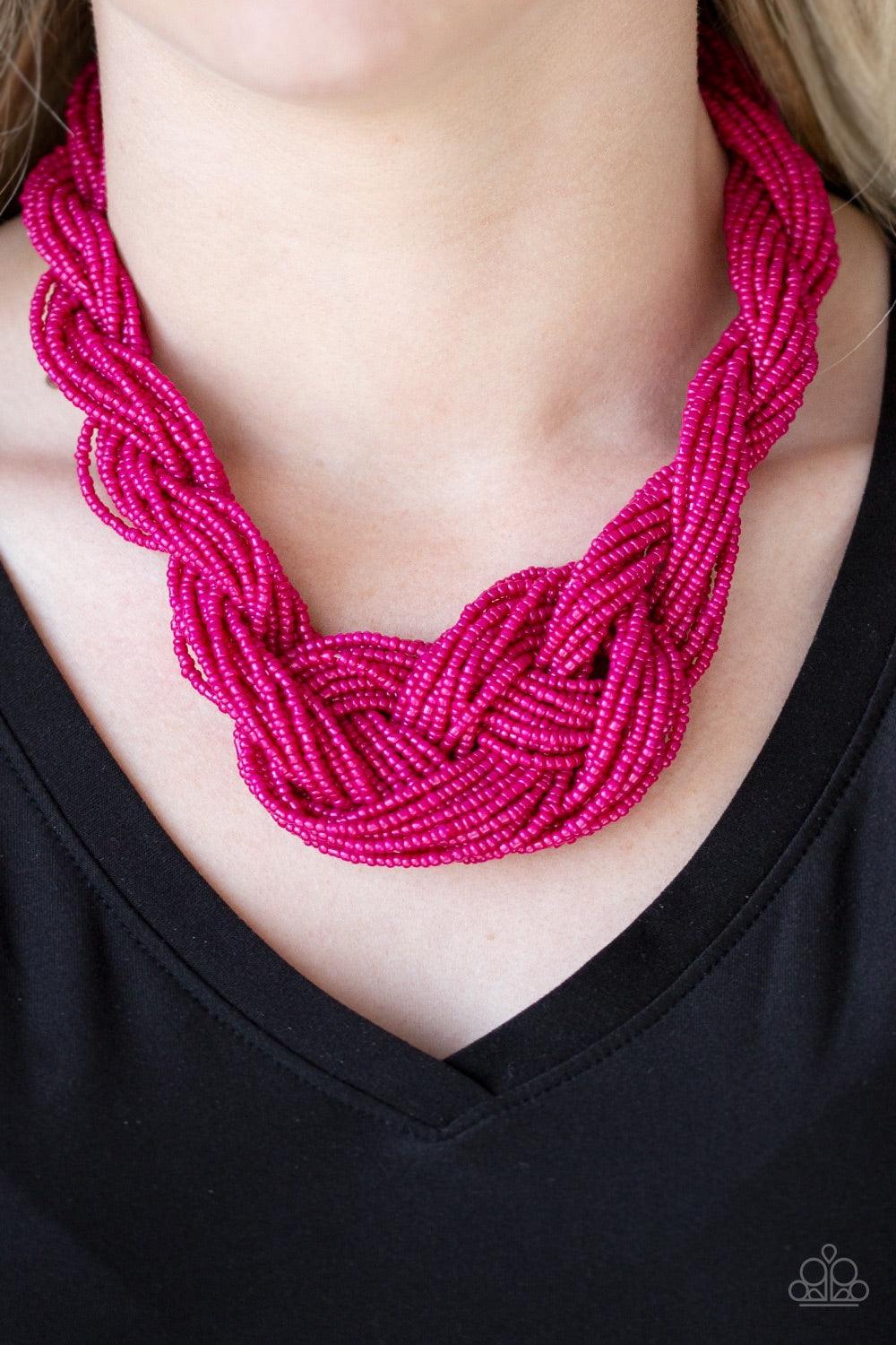 Paparazzi Accessories A Standing Ovation - Pink Countless strands of vivacious pink seed beads are twisted and knotted together to create an unforgettable statement piece. Features an adjustable clasp closure. Jewelry