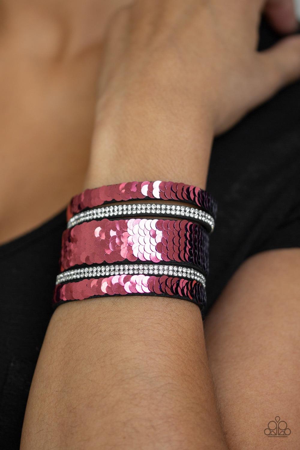 Paparazzi Accessories MERMAID Service - Pink Infused with strands of blinding white rhinestones, row after row of shimmery sequins are stitched across the front of a spliced black suede band. Bracelet features reversible sequins that change from blue to p